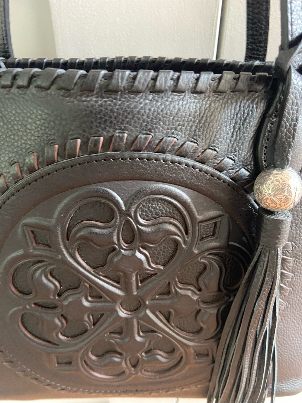 Brighton Black Leather Tote with Embossed Medallion and Tassel - Picture 3 of 15